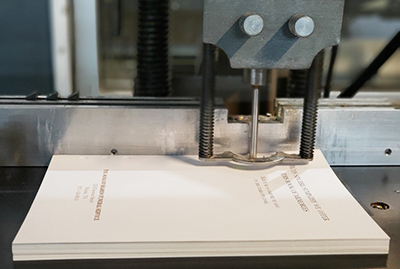 Drilling stack of paper